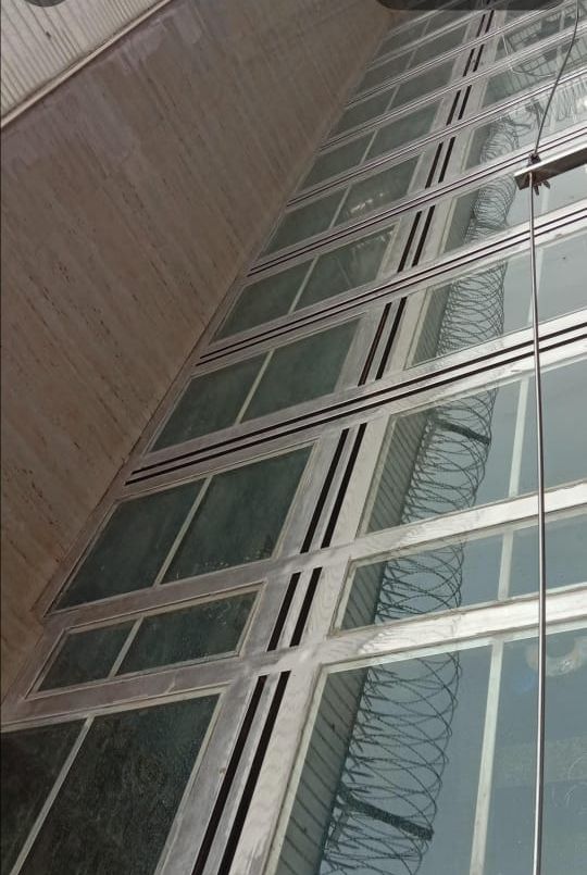 Glass and steel facade railing